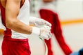 hands male gymnast in wrist wraps