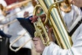 Hands of a male musician holding big tuba Royalty Free Stock Photo