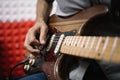 Hands of male musician playing electric guitar Royalty Free Stock Photo