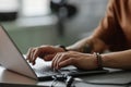 Hands of Male Programmer Typing on Laptop Keyboard Working in Office