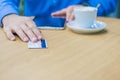 Hands of man giving plastic card to waiter to pay for the order. Royalty Free Stock Photo