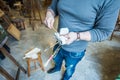 Hands of a man holding and cleaning his brushes Royalty Free Stock Photo