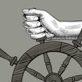 Hands of man holding a steering wheel