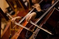 Hands of the man playing the cello Royalty Free Stock Photo