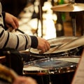 Hands of a man playing a drum set Royalty Free Stock Photo