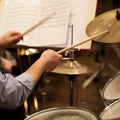 Hands of a man playing a drum set Royalty Free Stock Photo