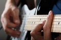 Hands of man playing electric guitar Royalty Free Stock Photo