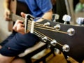 Hands of a man playing the guitar. Bending technique. Low key photo Royalty Free Stock Photo