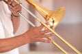 Hands of the man playing the trombone Royalty Free Stock Photo