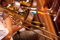 Hands of man playing the trombone Royalty Free Stock Photo