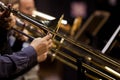 Hands of man playing the trombone Royalty Free Stock Photo