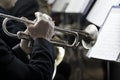 Hands of the man playing the trumpet Royalty Free Stock Photo