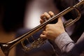 Hands of man playing the trumpet in the orchestra Royalty Free Stock Photo