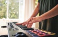 Hands, man and synthesizer piano for music, talent and skills in home studio. Closeup, musician and playing electrical