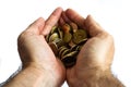 Hands of man up close holding isolated euro coins