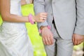 Hands of man and woman bride groom in handcuffs Royalty Free Stock Photo