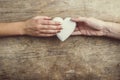 Hands of man and woman connected through a heart. Royalty Free Stock Photo