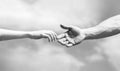 Hands of man and woman reaching to each other, support. Giving a helping hand. Black and white Royalty Free Stock Photo