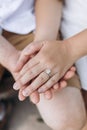 Hands of a man and woman with a wedding ring close-up Royalty Free Stock Photo