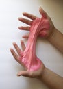 Hands Manipulating Pink Slime