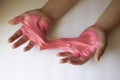 Hands Manipulating Pink Slime