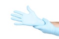 Doctor putting on blue sterilised medical glove for making operation Royalty Free Stock Photo