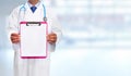 Hands of medical doctor with clipboard. Royalty Free Stock Photo