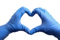 Hands in medical gloves depict a heart on a white background, isolated. Recovery