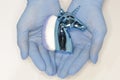 Hands in medical gloves. Sanitary standards and disinfection. Women's hands in protective products.