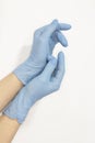 Hands in medical gloves. Sanitary standards and disinfection. Women\'s hands in protective products.