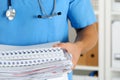 Hands of medicine therapeutist doctor wearing blue uniform