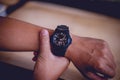 Men`s black wrist watches, punctuality concepts Royalty Free Stock Photo