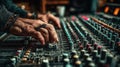 Hands Mixing Audio on Control Panel at Professional Recording Studio Royalty Free Stock Photo