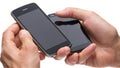 Hands Mobile Cel Phone. A mans hand using a touchscreen call phone with a blank screen