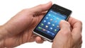 Hands Mobile Cel Phone. A mans hand using a touchscreen call phon
