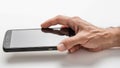 Hands Mobile Cel Phone. A mans hand using a touchscreen call phone