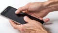 Hands Mobile Cel Phone. A mans hand using a touchscreen call phone