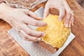 Hands modeling cake icing