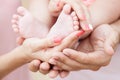 The hands of moms and dads keep baby legs Royalty Free Stock Photo