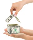 Hands and money house Royalty Free Stock Photo