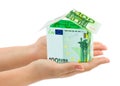 Hands and money house Royalty Free Stock Photo