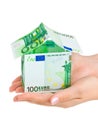 Hands and money house Royalty Free Stock Photo