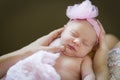 Hands of Mother Holding Her Newborn Baby Girl Royalty Free Stock Photo