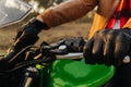 Hands of a motorcyclist on the road having fun driving on the empty road on a motorcycle trip.