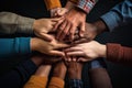 Hands of multiethnic people forming a circle on black background, Stack of hands showing unity and teamwork, AI Generated Royalty Free Stock Photo