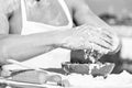 Hands of muscular baker or cook kneading dough in bowl. Hands of chef cook working with dough and flour. Bowl with dough Royalty Free Stock Photo