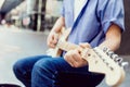 Hands of musician with guitar Royalty Free Stock Photo