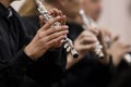 Hands musician playing the flute Royalty Free Stock Photo