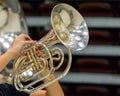 Hands of a musician playing a mellophone Royalty Free Stock Photo