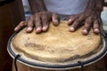 Hands of a musician playing percussion in presentation